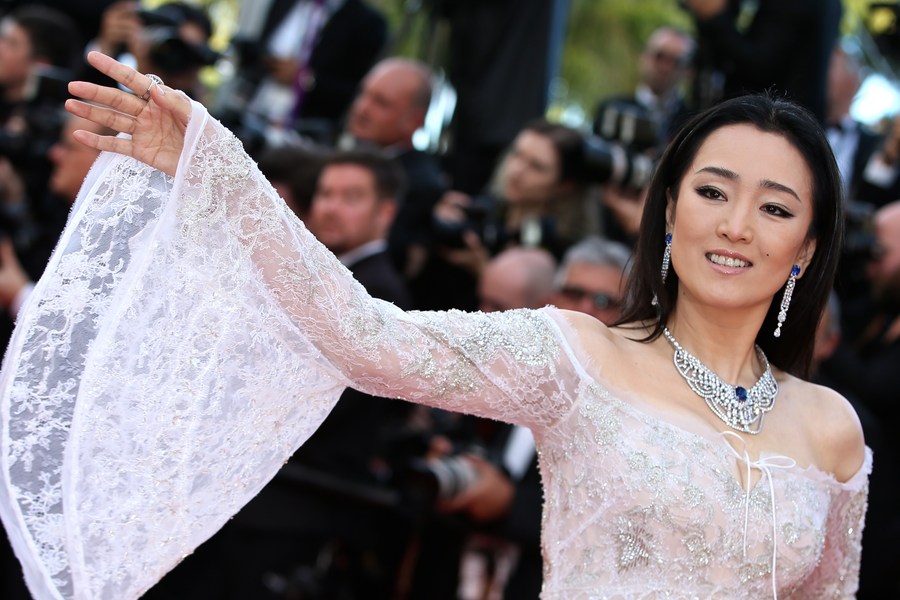 Chinese actress Gong Li poses on the red carpet before the opening of the 69th Cannes Film Festival in Cannes, France. Photo: Jin Yu